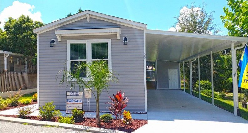 Florida manufactured home needing replacement windows and doors.