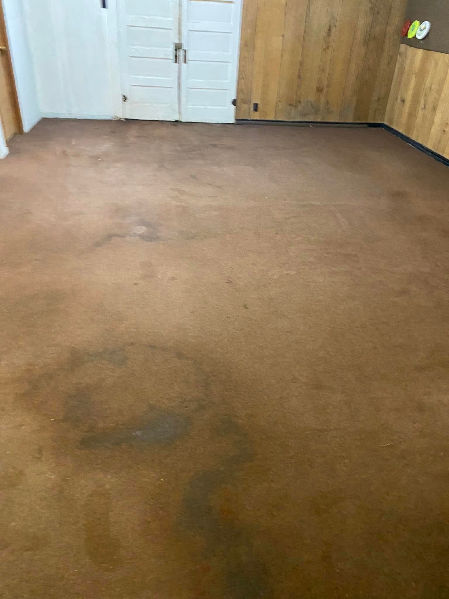 Before Cleaning the Red Floor - Princeton, IN - D&T Power Washing