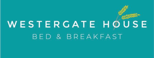 a blue logo for westergate house bed and breakfast near York city centre