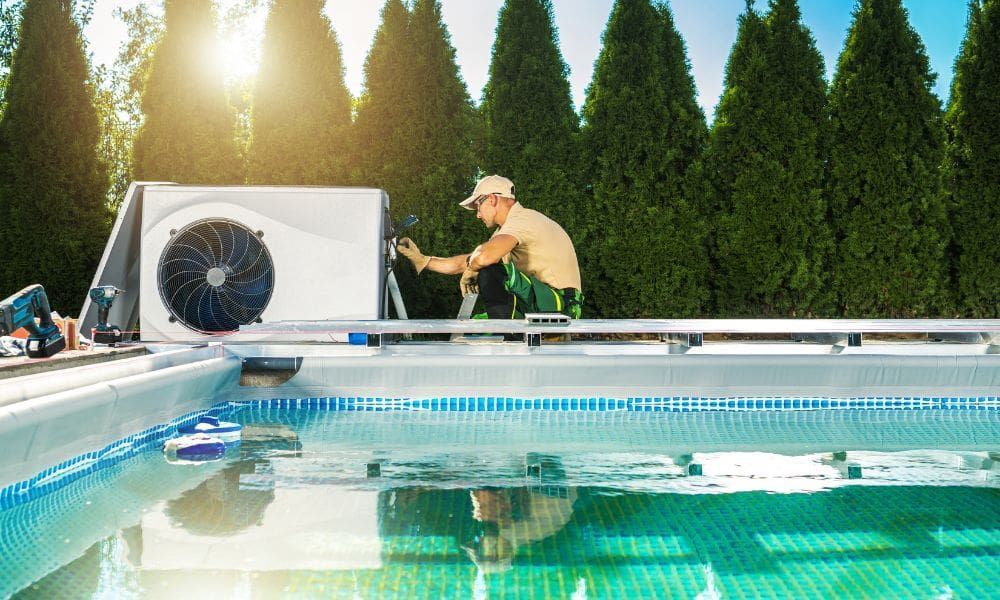 Technician servicing pool heater