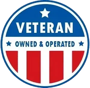 a veteran owned and operated sign with an american flag in the background
