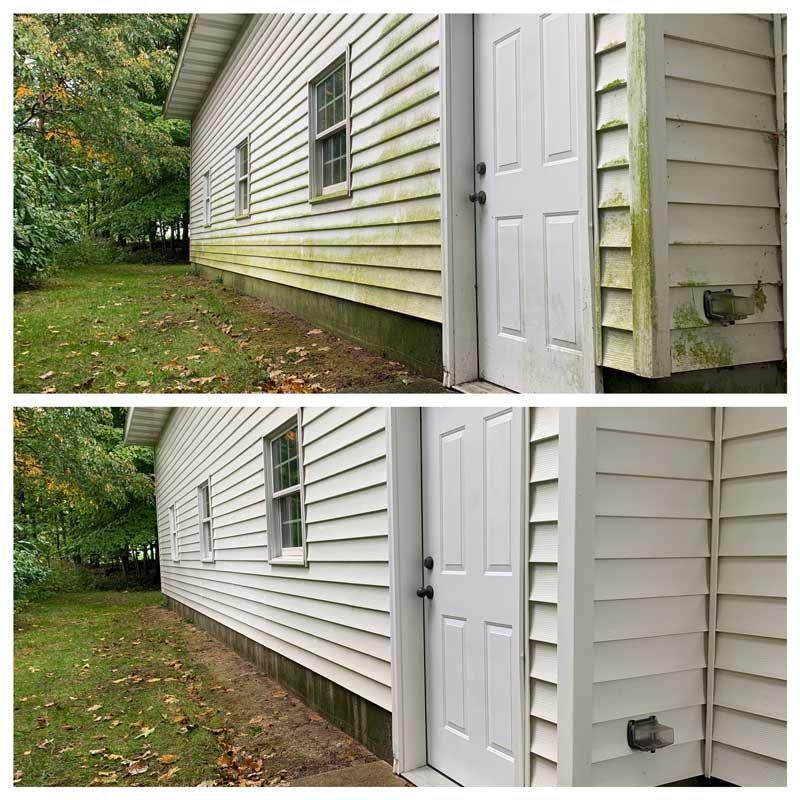 Before-and-after view of a white house's siding being cleaned.