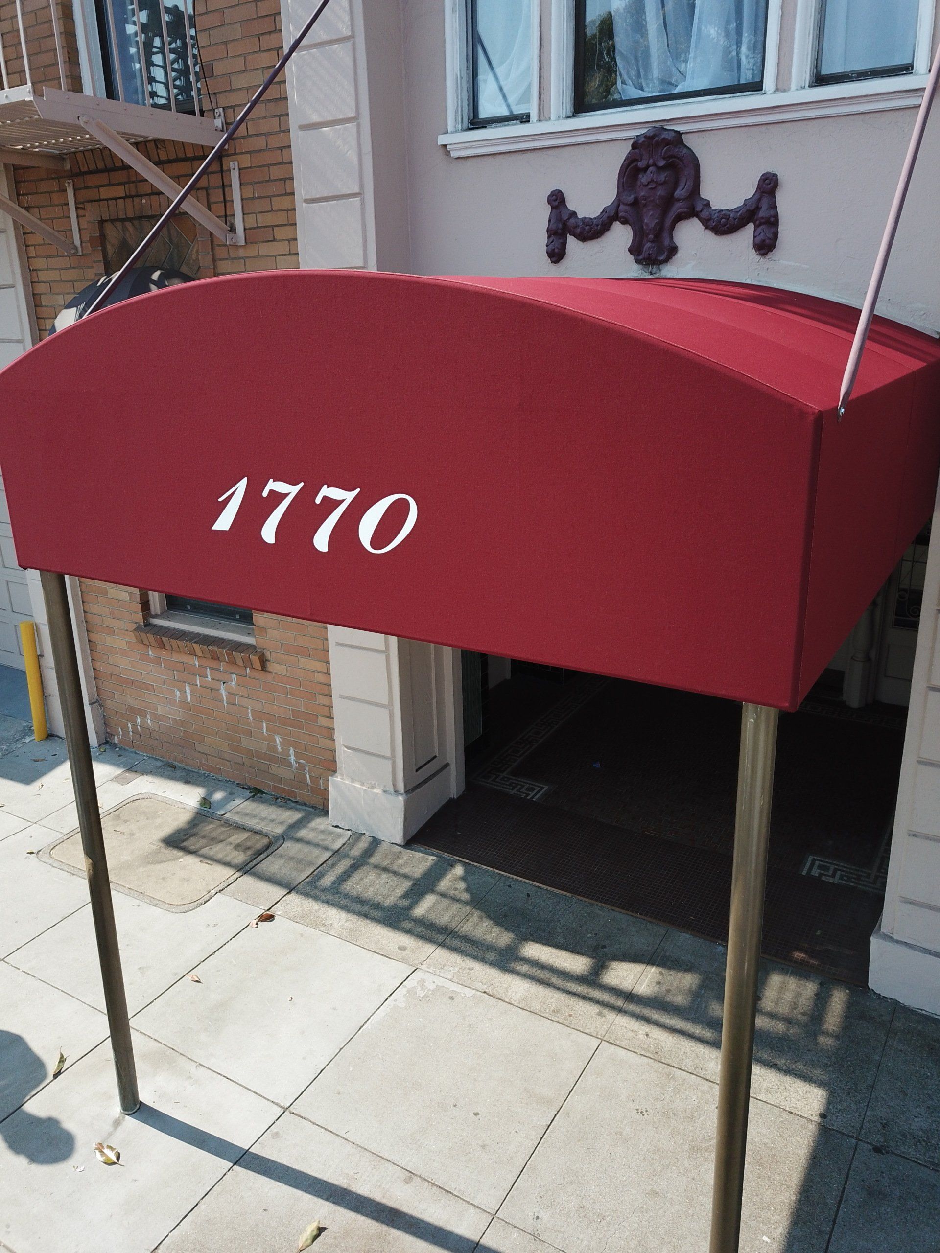 A red awning with the number 1770 on it