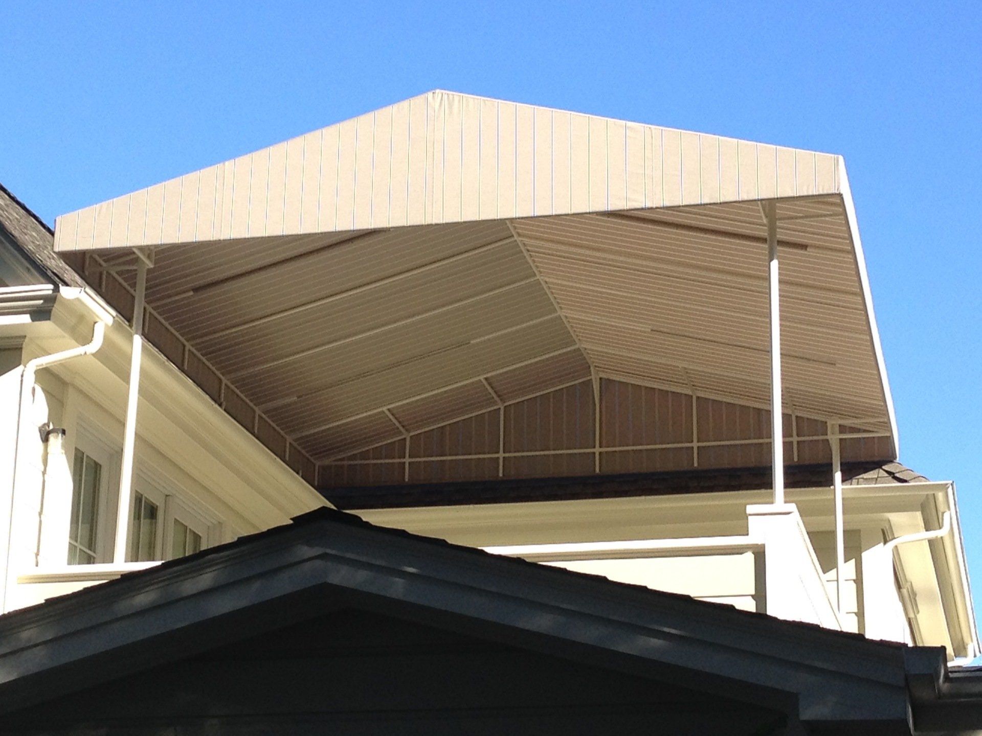 A house with a large awning on the roof