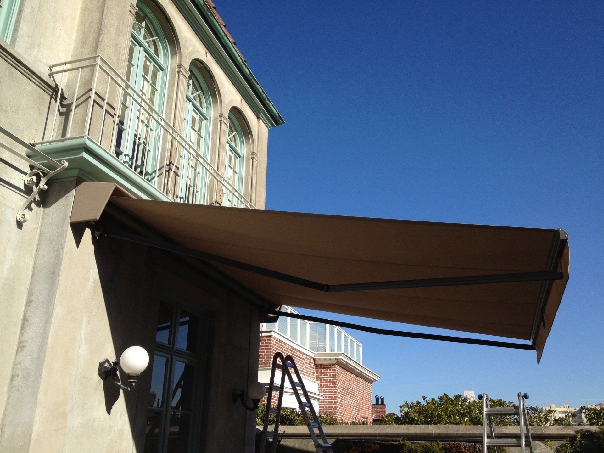 A building with an awning on the side of it