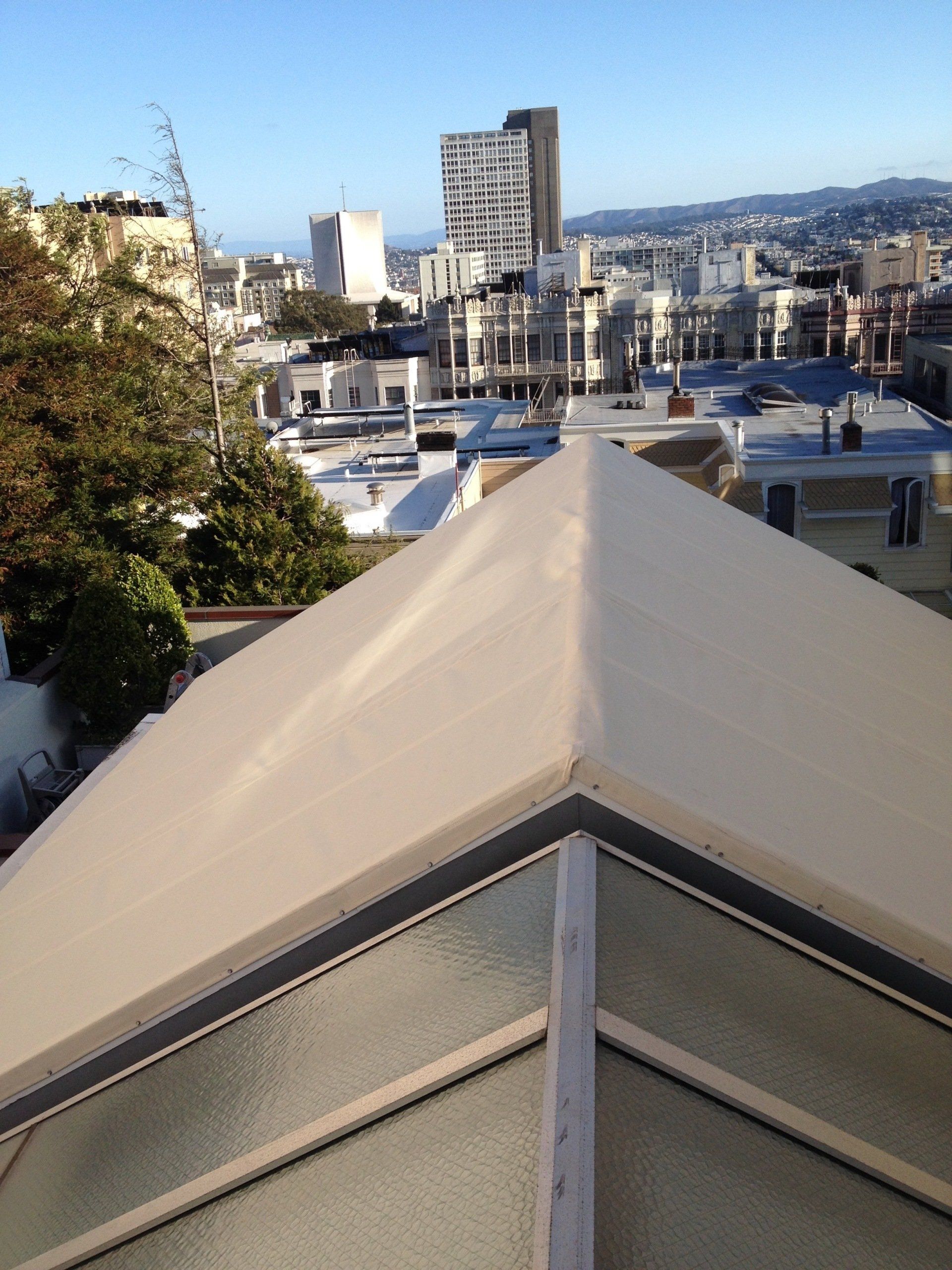 A view of a city from the top of a building