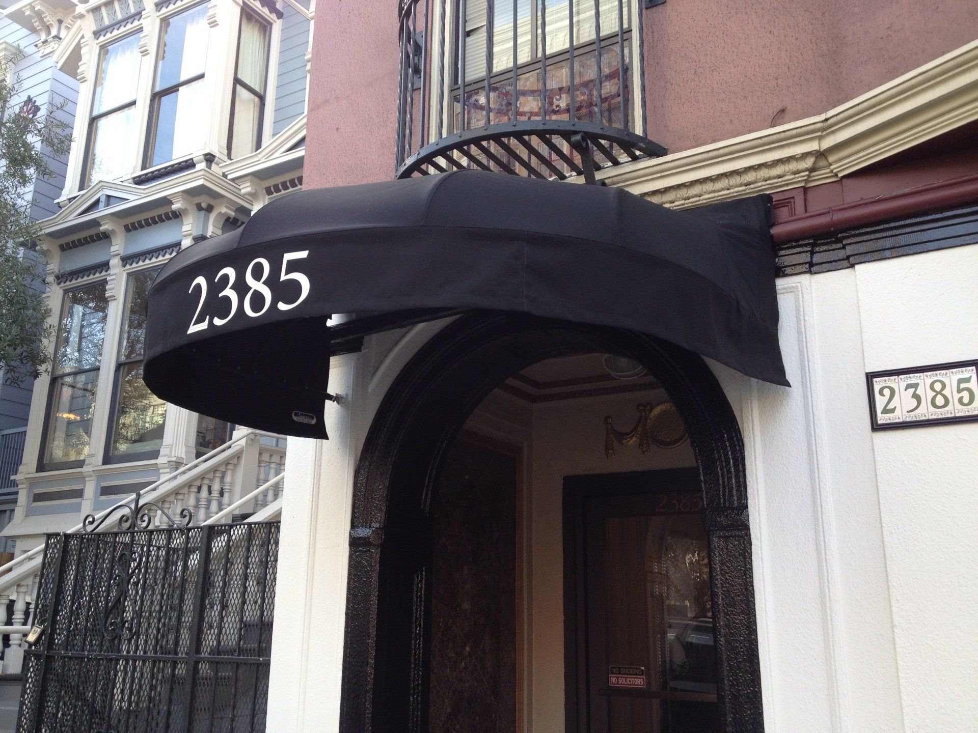 A black awning with the number 2385 on it