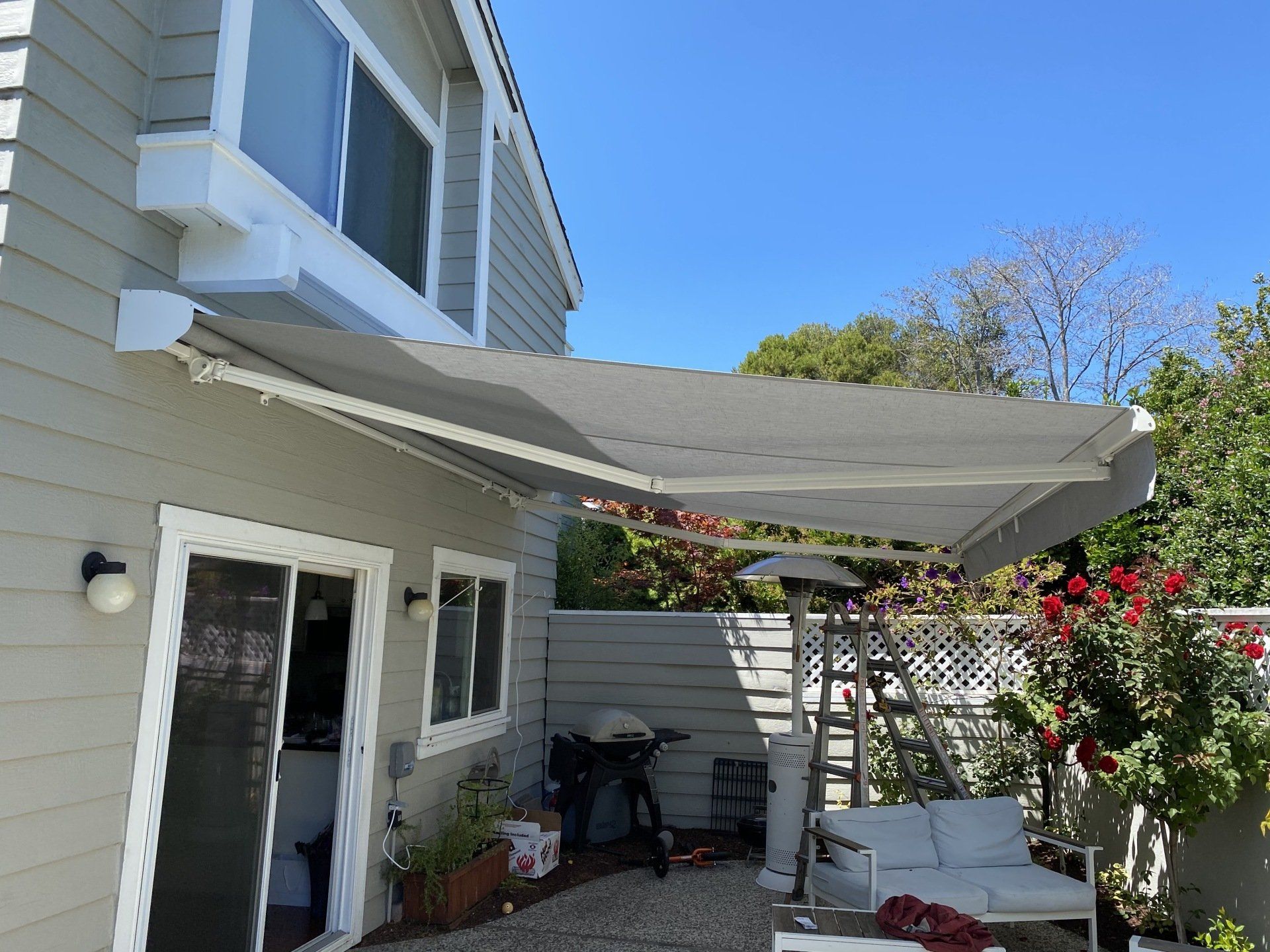 A house with an awning on the side of it