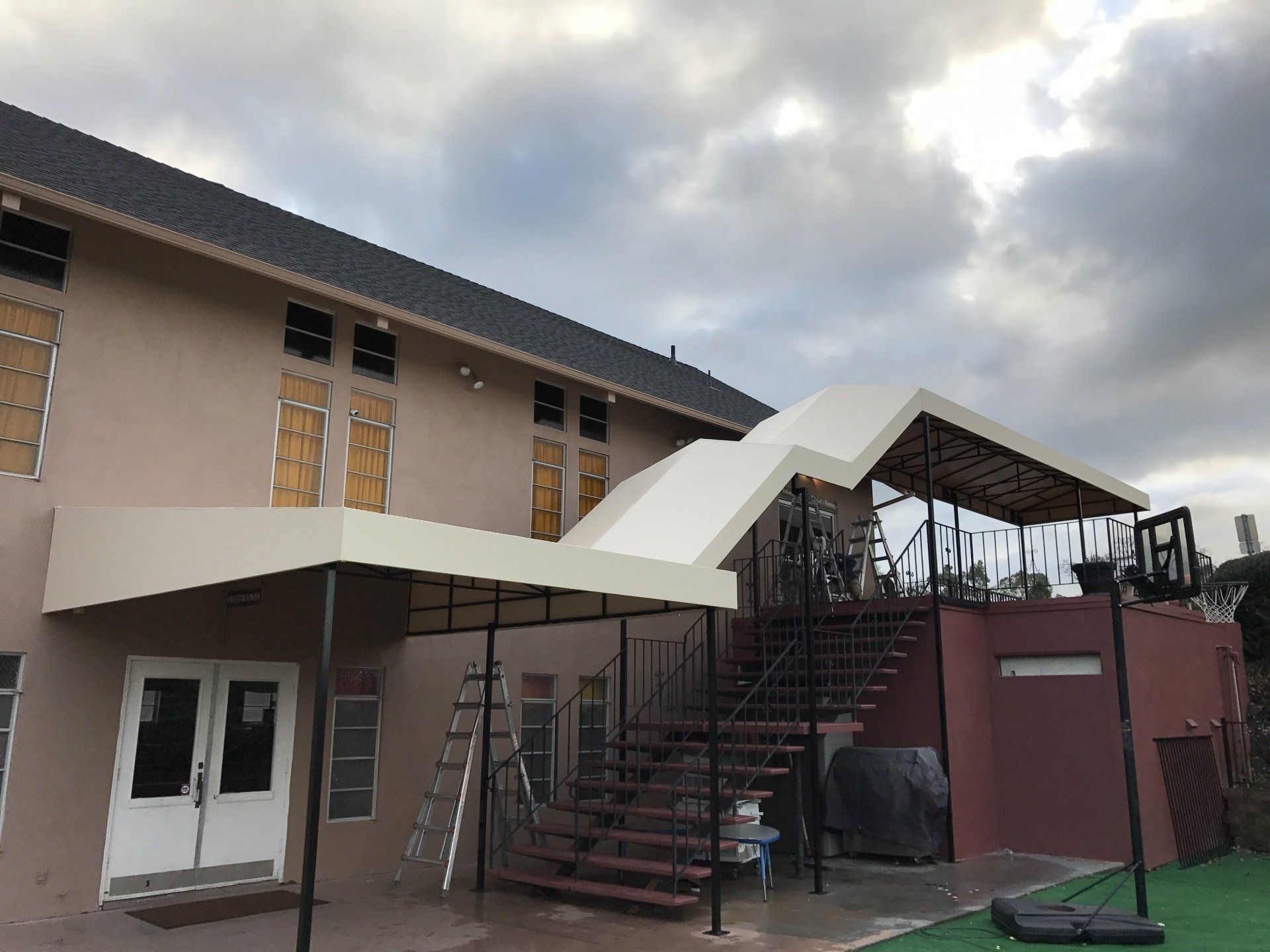 A large building with stairs leading up to it