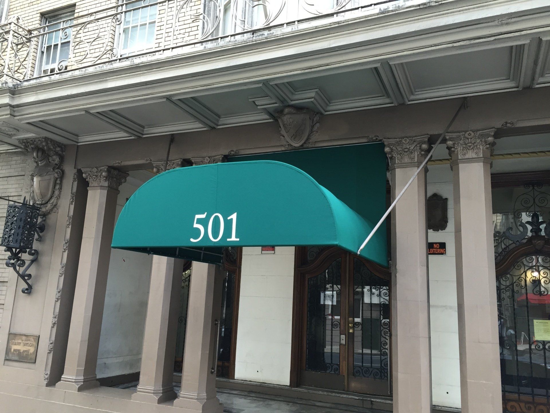A green awning with the number 501 on it