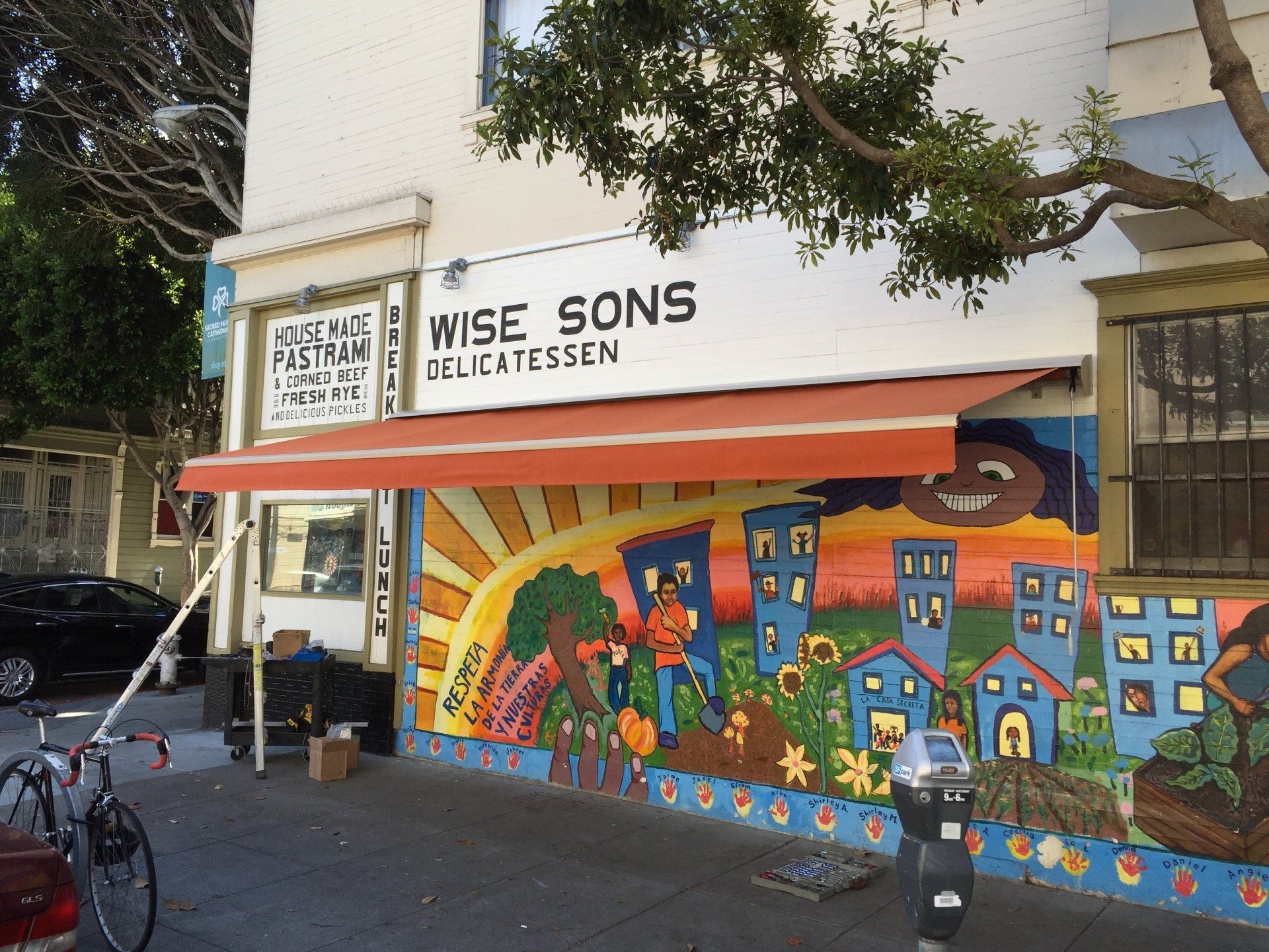 Wise sons delicatessen has a large mural on the side of the building