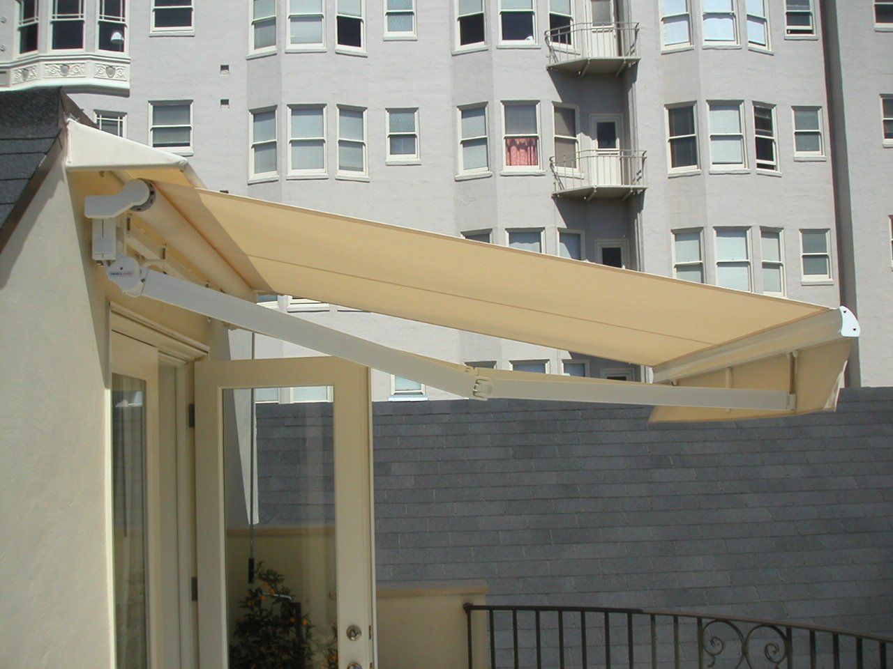 A building with an awning on the side of it