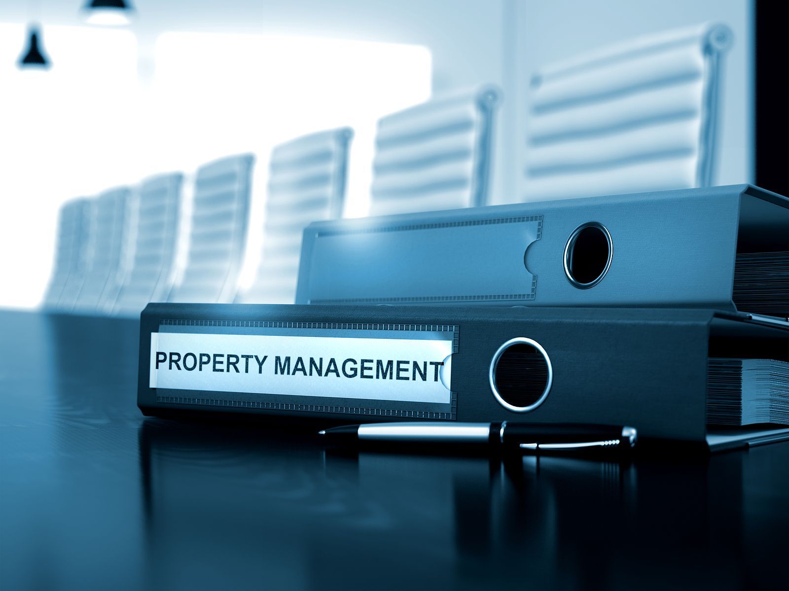 A binder with the word property management on it