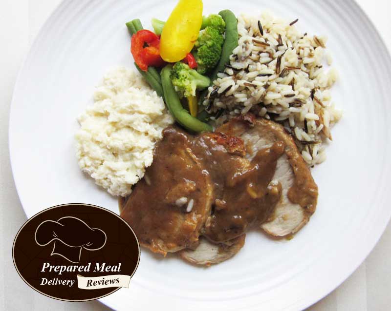 Roasted Pork with Onion Sauce, White and Wild Rice, Cauliflower Puree, Caribbean Vegetables