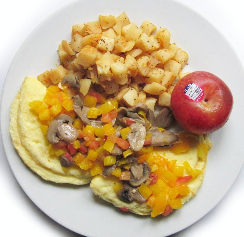 Two Omelets with Potatoes and an Apple