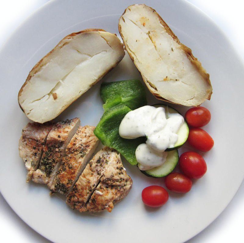 Turkey Breast with a Baked Potato and Raw vegetables