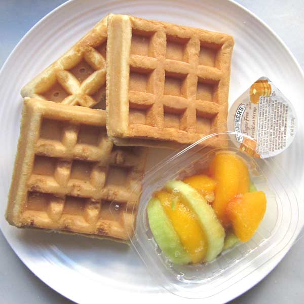 Waffles with Peaches and Apples in Syrup