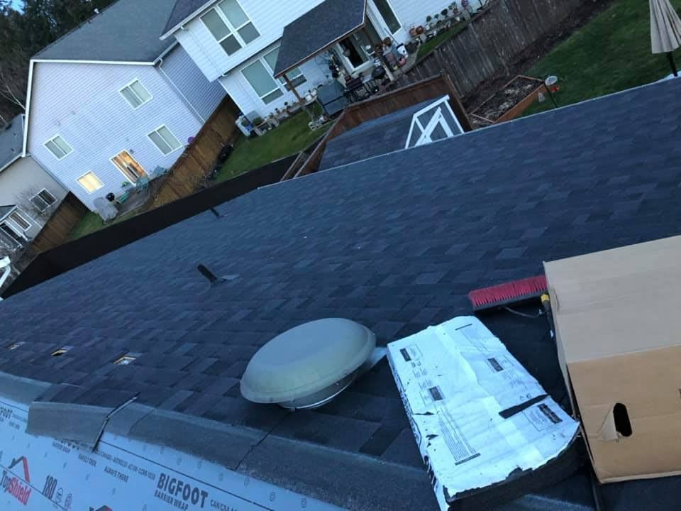 A roof with a box and a light on it