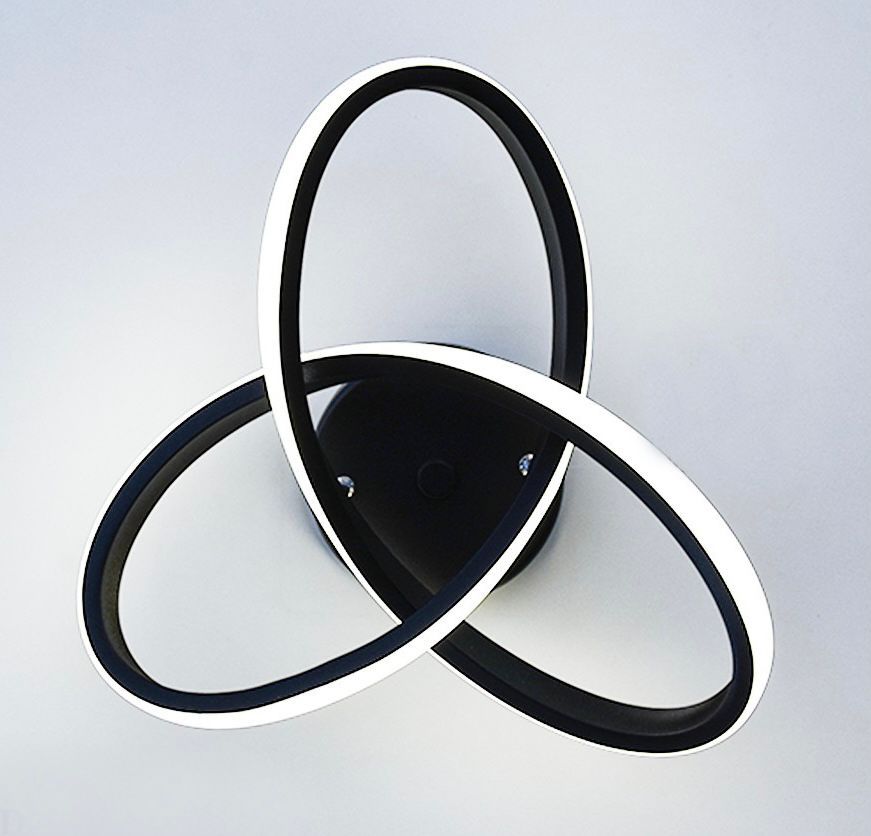 Aplique de pared moderno en blanco y negro con tres anillos interconectados de forma ovalada.