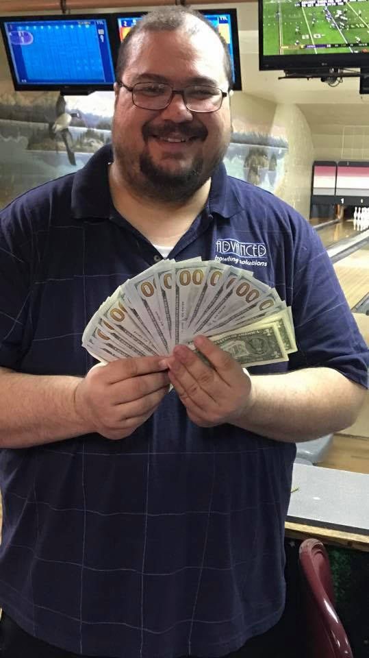 Bowling - Man Holding a Money in Everett, WA