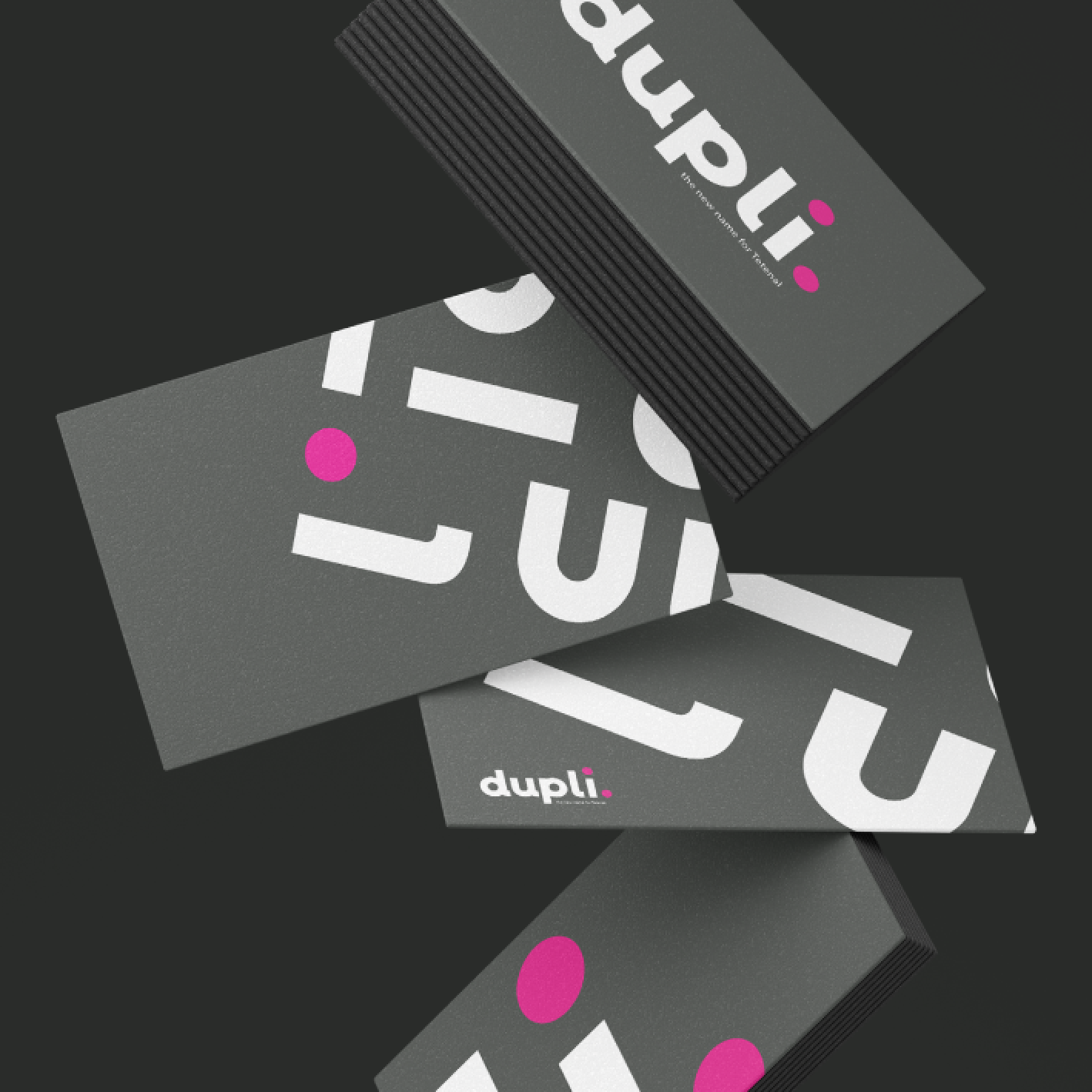 Gray business cards with white text and pink accents are floating in the air.
