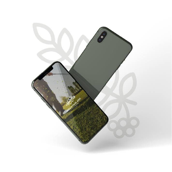 Two olive green smartphones with a nature-themed app display, floating against a leaf graphic.