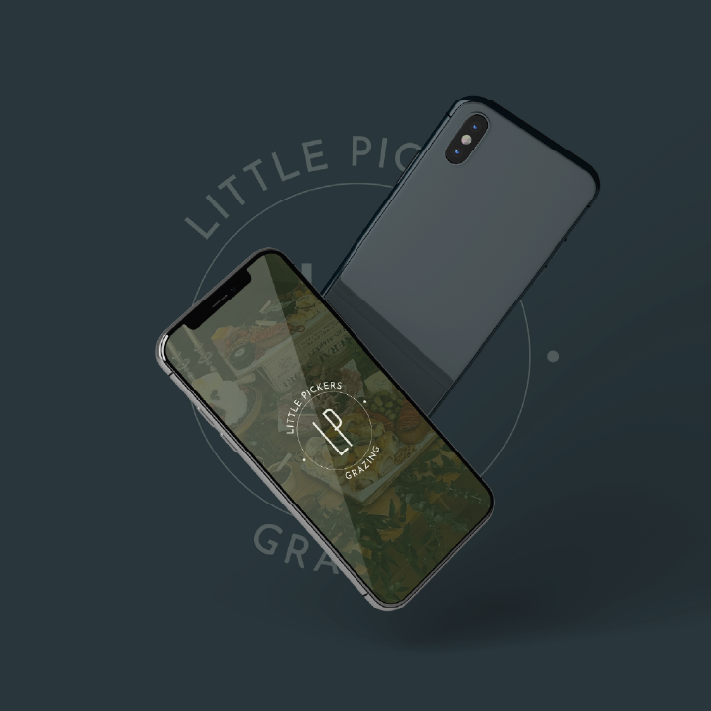 Two dark grey smartphones, one showing a logo, against a teal background.