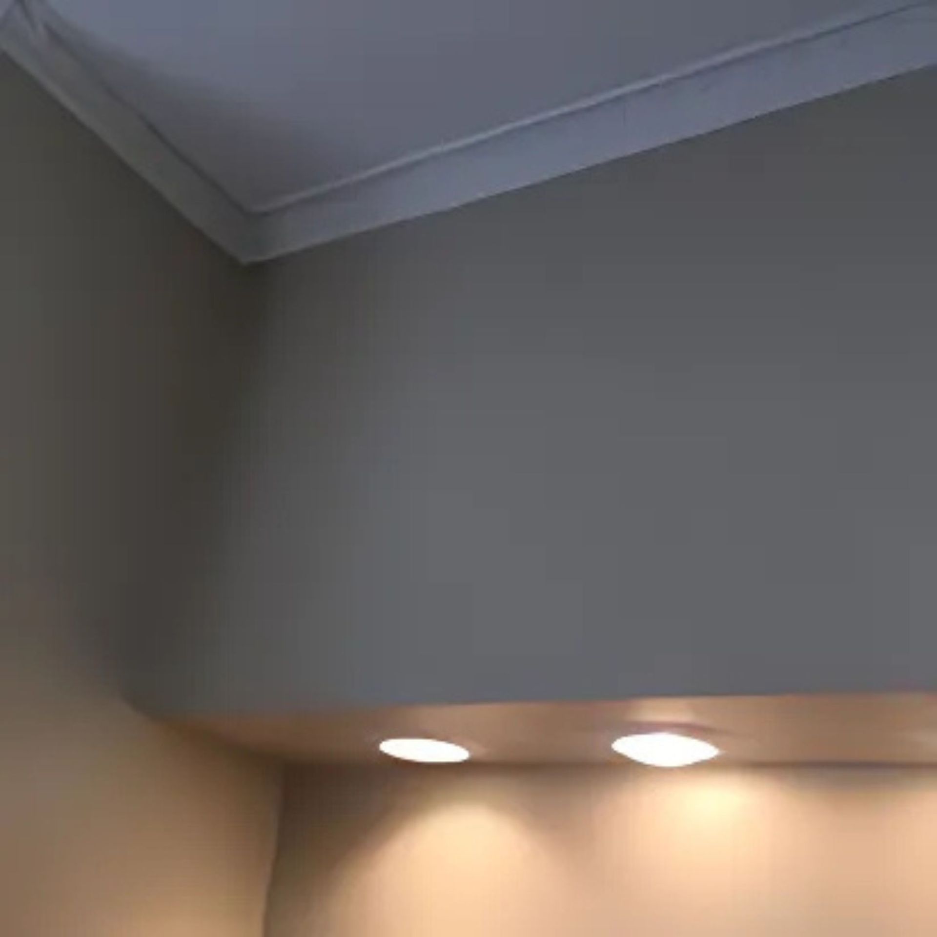 Masters Touch Roofing - There are three lights on the ceiling of a room.