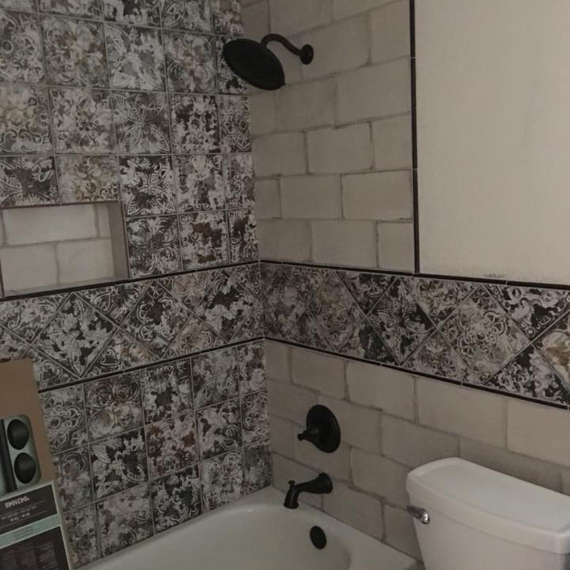 Masters Touch Roofing - A bathroom with a bathtub a toilet and a shower