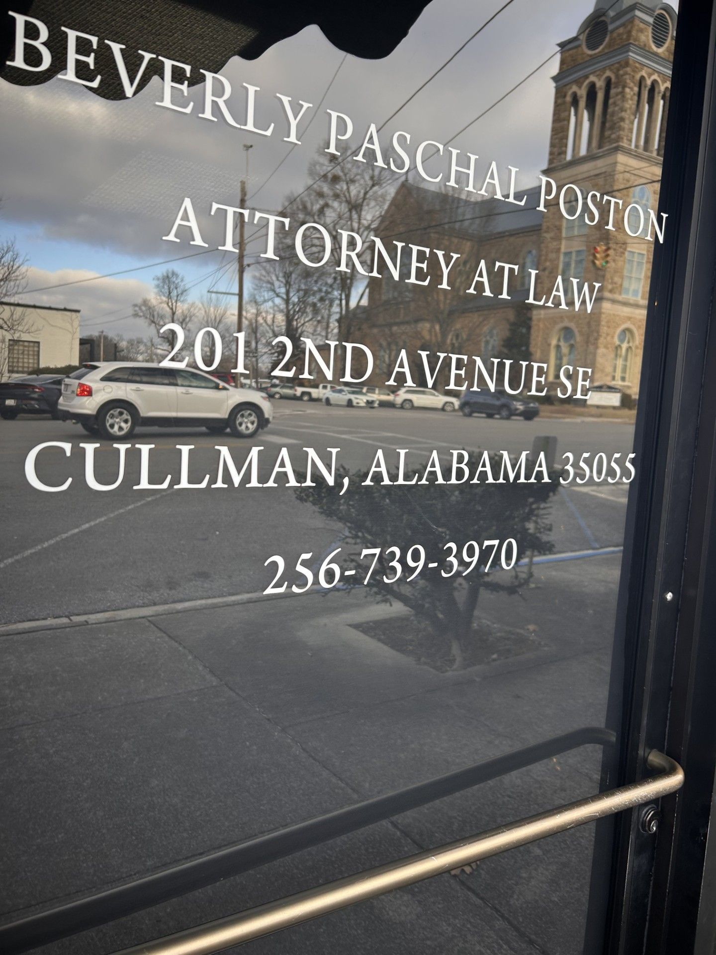 A sign for beverly paschal poston attorney at law