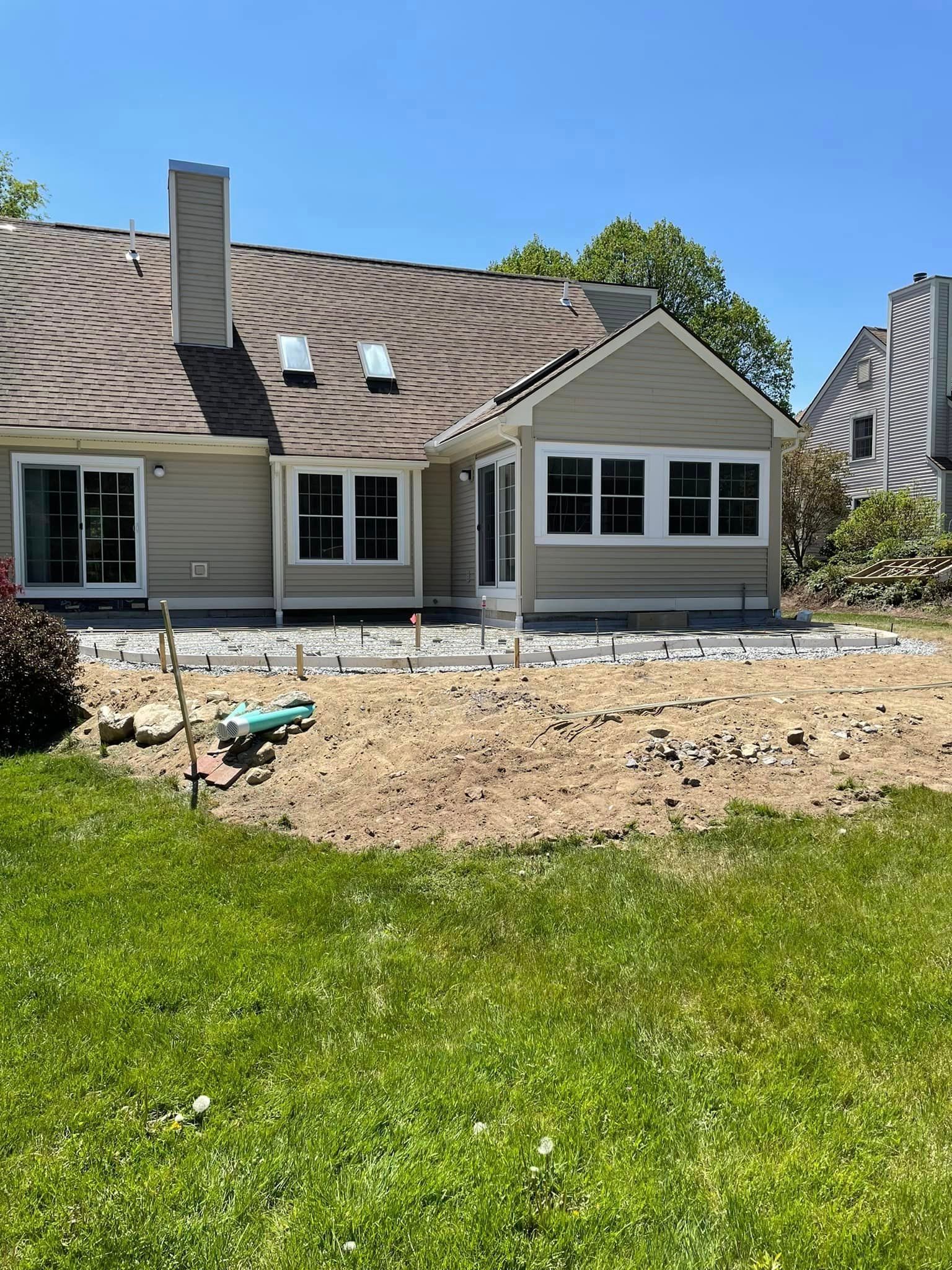 A house with a lot of windows is being remodeled.