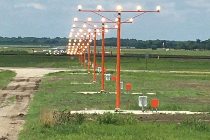 Electrician near the low-voltage cabinet