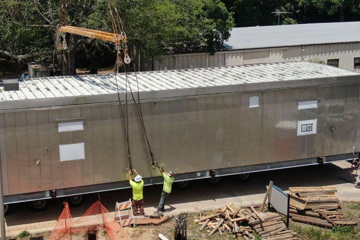 Electrician near the low-voltage cabinet