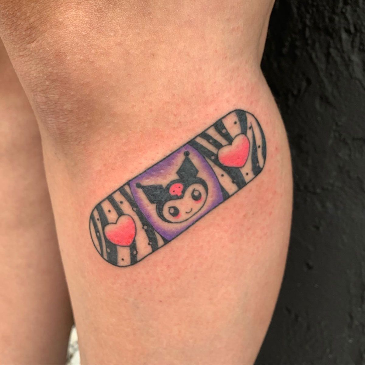 cat tattoo and pokimon tattoo