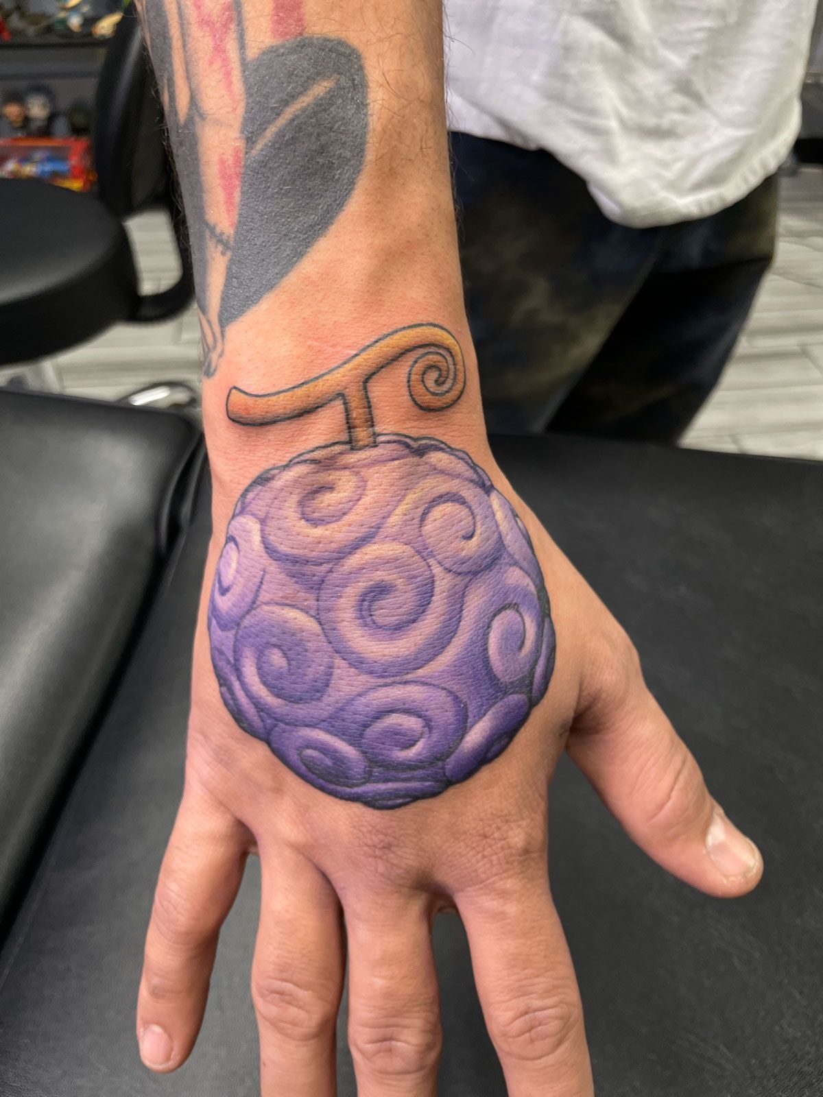 hand tattoo and custom ink tattoo
