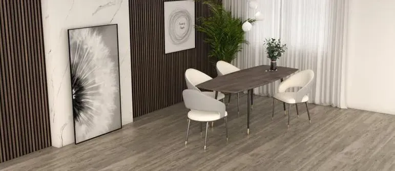 Dining room with a table, chairs, artwork, and curtains. Modern design with neutral colors.