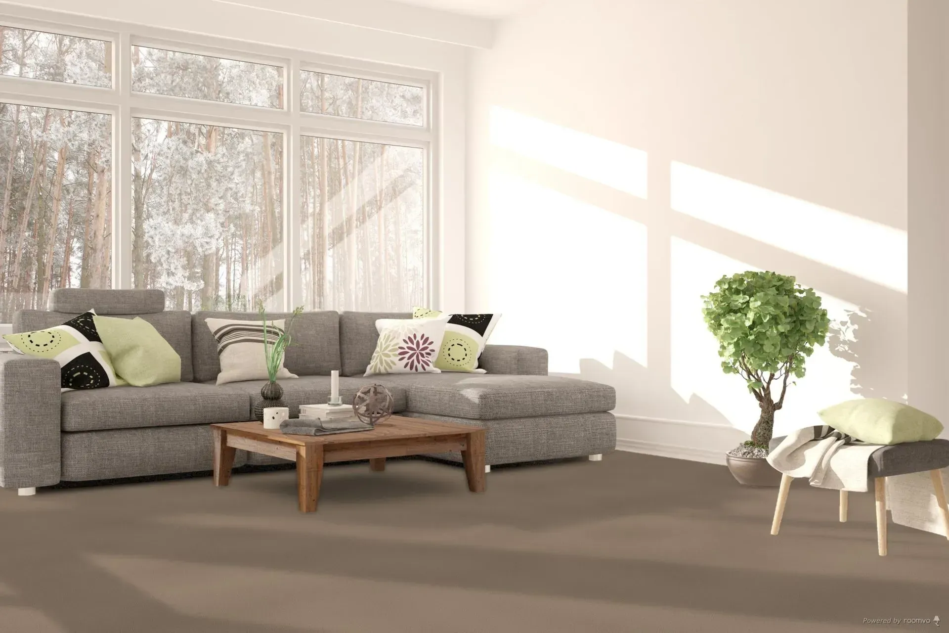 Living room with gray sectional sofa, wooden coffee table, large window, and potted tree.
