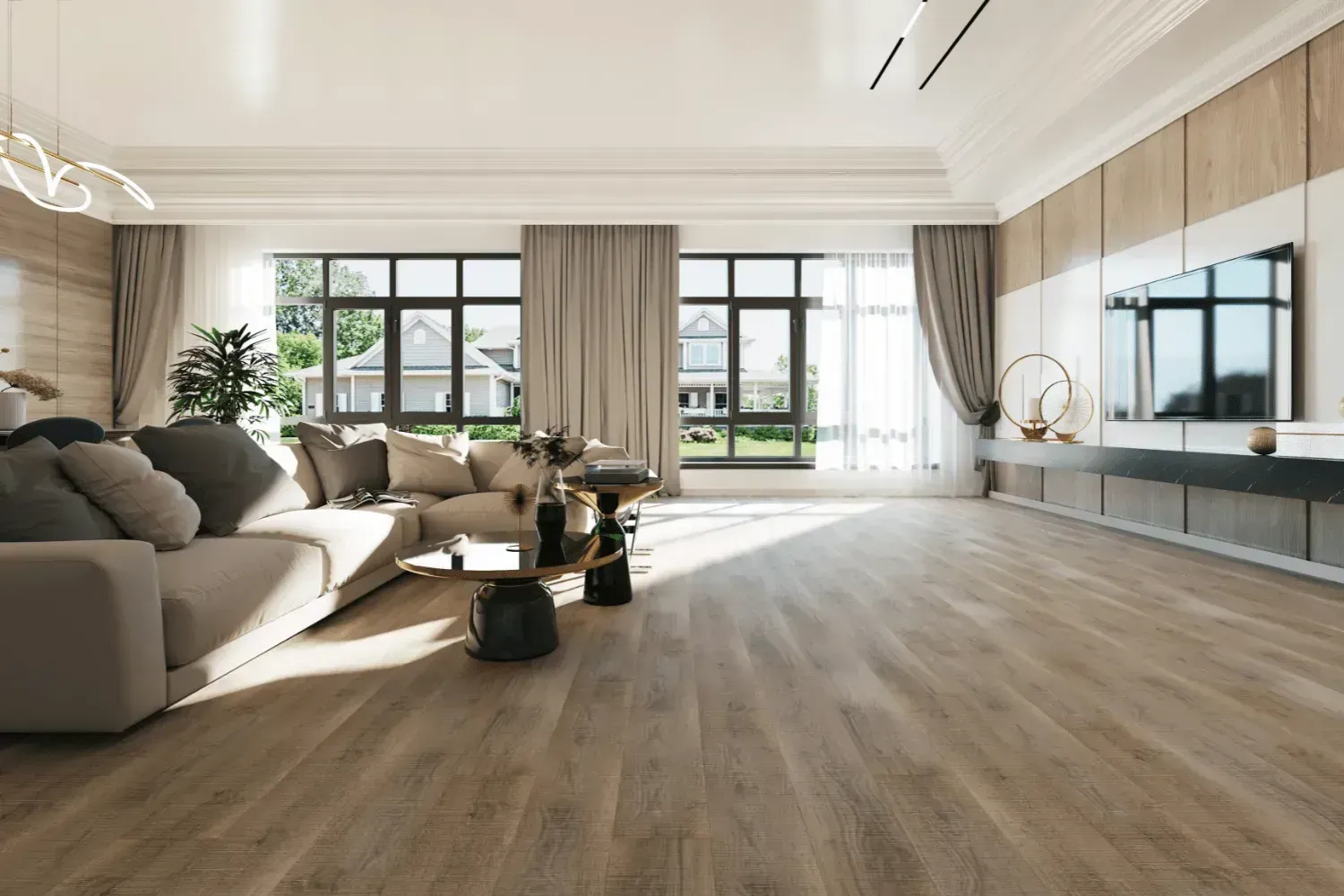 Spacious living room with light wood floors, sofa, large windows, TV, and neutral color palette.