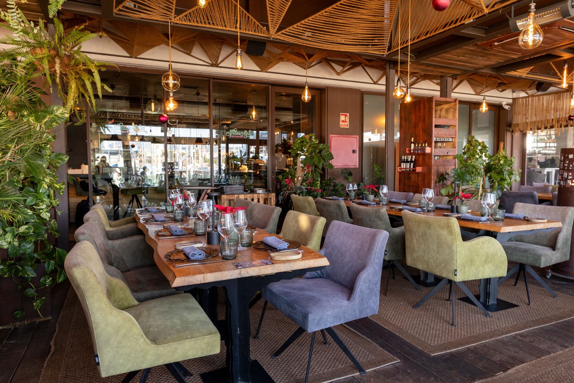 A restaurant with a lot of tables and chairs