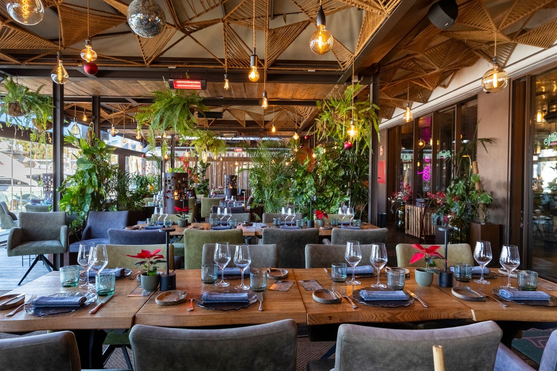 A restaurant with a lot of tables and chairs