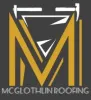 Yellow and white "M" logo with roofing tools, text reads "MCGLOTHLIN ROOFING".