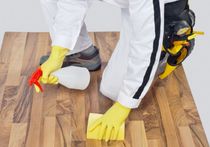 Man Spray the Floor - Surface Protection Products in Harrisburg, PA