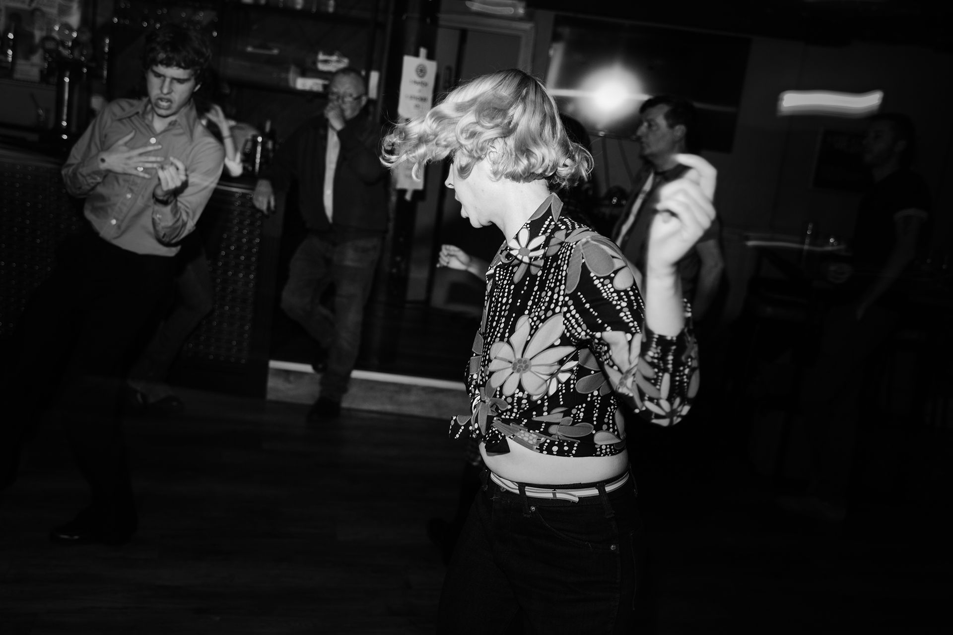 Black and white shot of a girl dancing to Northern Soul shot by Dammo Photography
