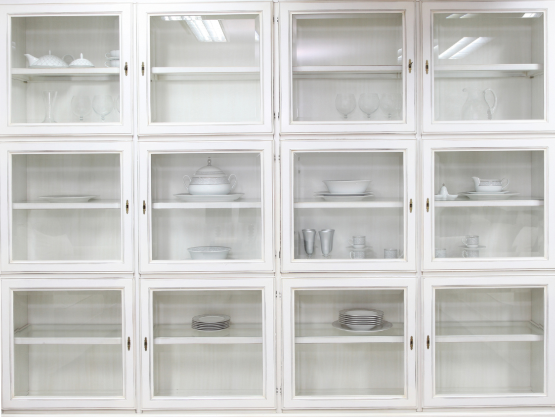 A large house with a lush green lawn in front of it.