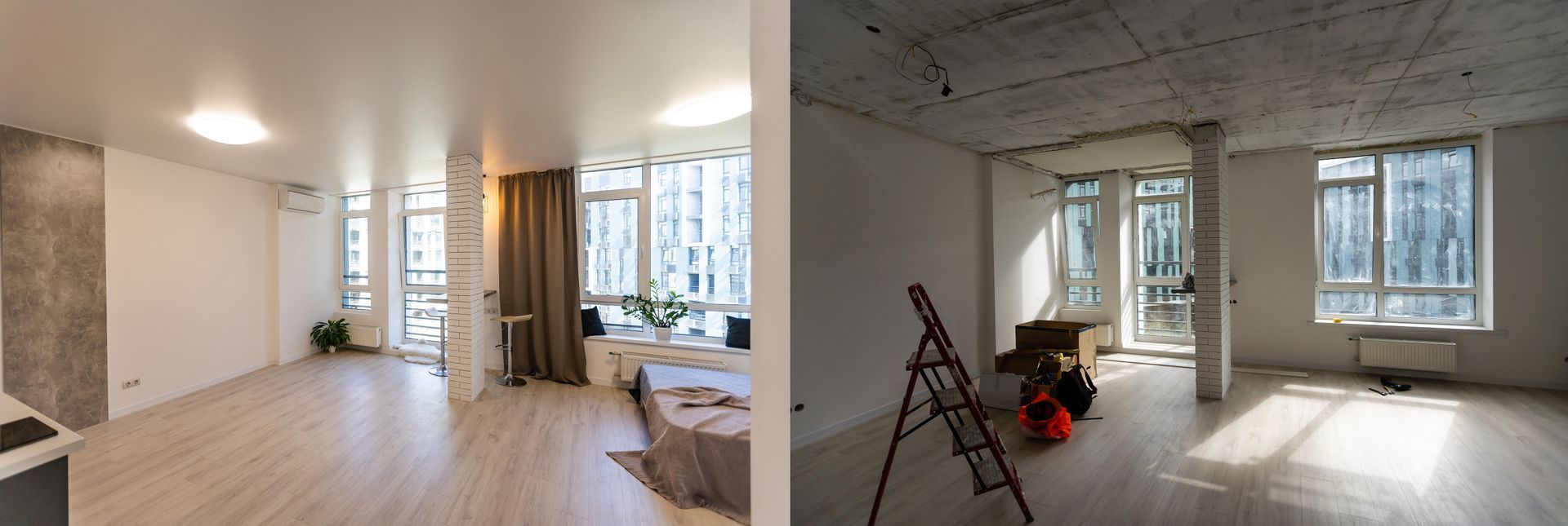 Interior of a room with moving boxes, large windows looking out onto a snowy landscape, and pendant lights.