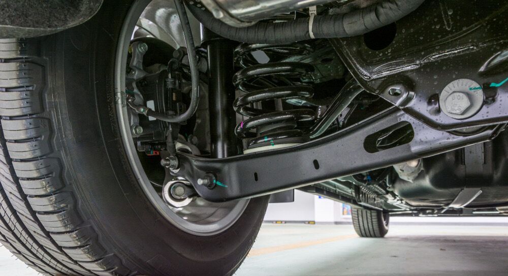 A Close Up Of The Underside Of A Car With A Tire And Shock Absorber — Browns Autobahn In Nambour, QLD