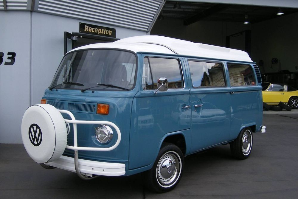 A Blue And White Van Is Parked In Front Of A Building That Says Reception — Browns Autobahn In Nambour, QLD