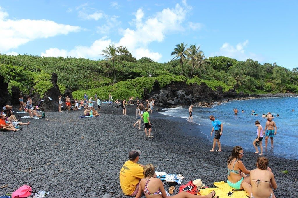 On the Waiʻānapanapa State Park black sand beach with Mana Vans Maui.