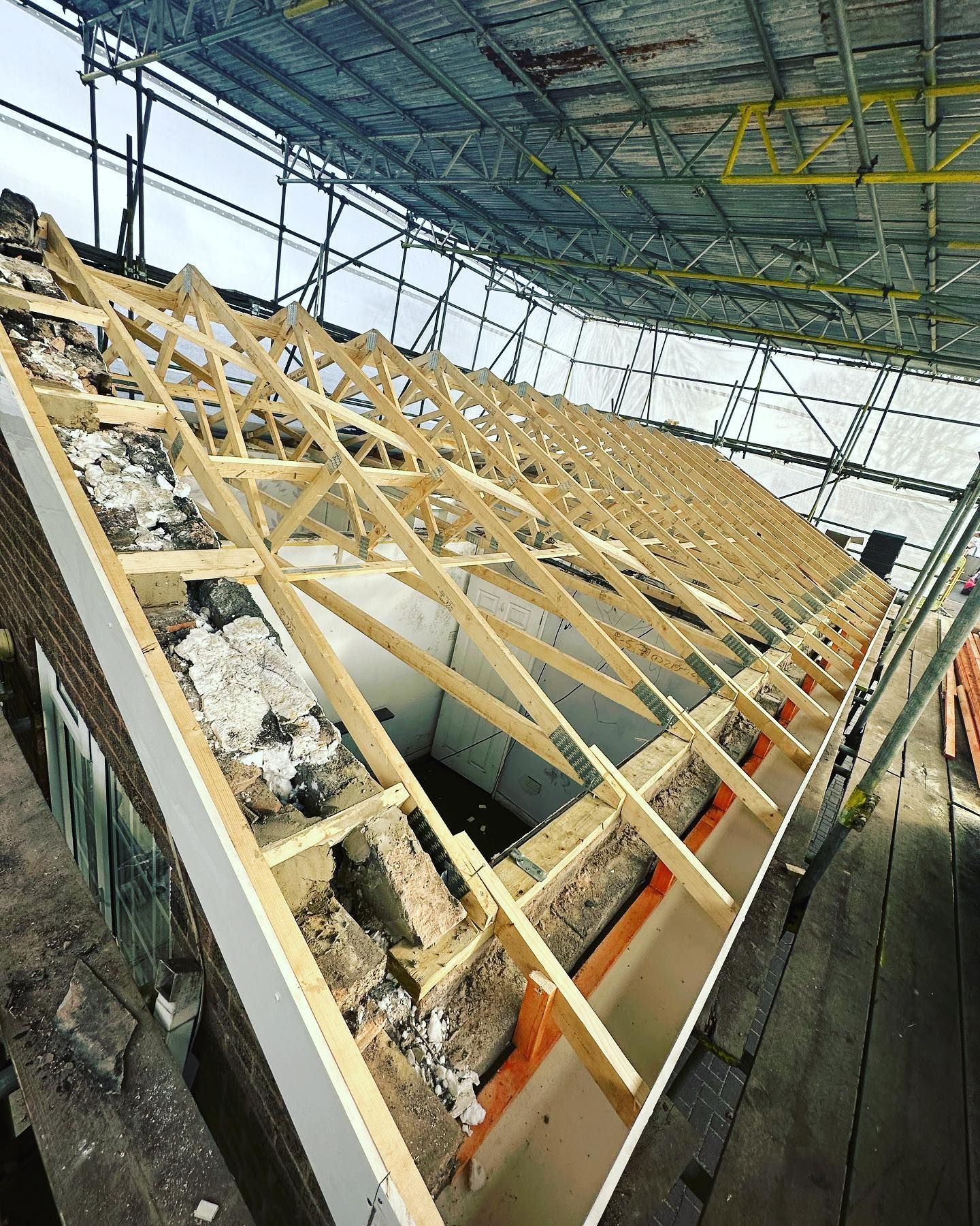 a picture of a roof during replacement by Hightop roofers Rotherham