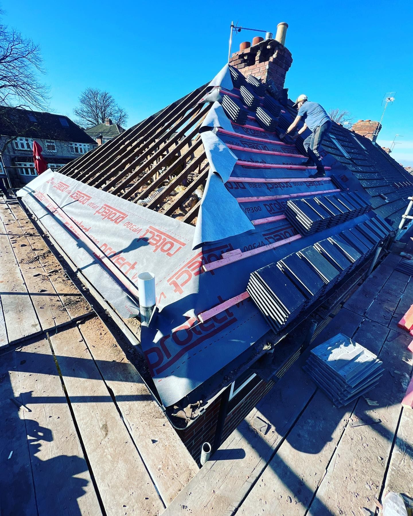 a picture of a hipped roof replacement by Hightop roofers Rotherham